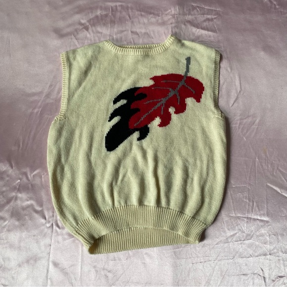 Unisex knit sweater vest with black and red leaf print on the front - Picture 1 of 3